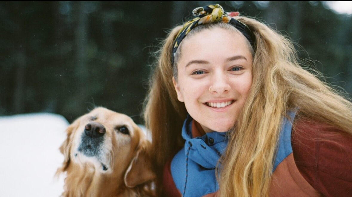 A picture of Devon Ball with her dog